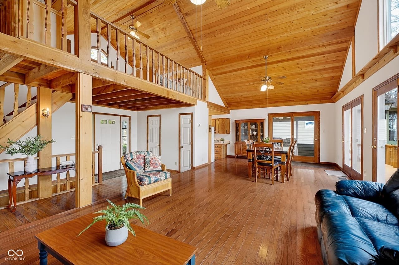 Open living and dining with loft above